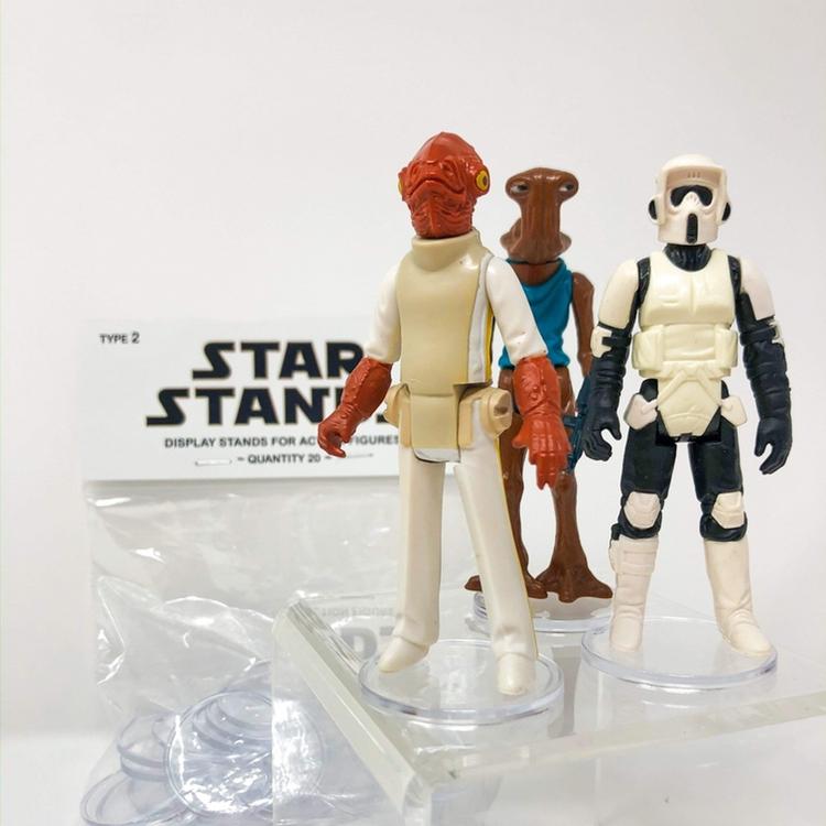 http://4thmoontoys.com/cdn/shop/products/vintage-star-wars-4th-moon-toys-supplies-vintage-star-stands-star-wars-figure-stands-16992774324356_1200x1200.jpg?v=1628210091